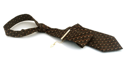 Tie with a gold pin