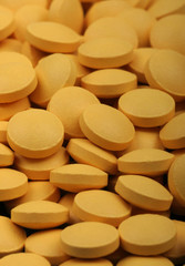 Yellow medical pills