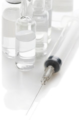 Syringe and vials with a medicine