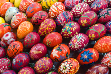 Fototapeta na wymiar Yellow, red, orange painted Easter Eggs
