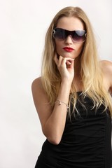 Fototapeta premium young female blond beauty with sunglasses