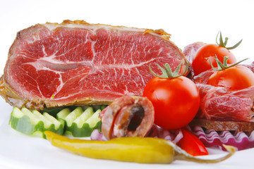 meat rolls and chunk on white