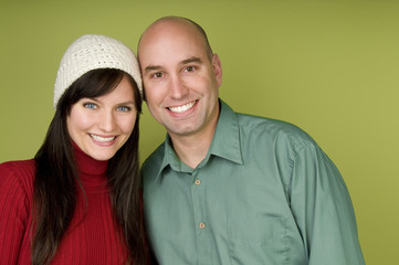 Couple holding gingerbread man