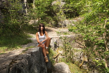 Naklejka premium Mountain girl resting in the sun