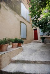 Fototapeta na wymiar Street view in village of provence, France