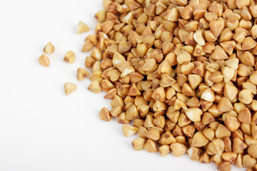Buckwheat seeds closeup isolated on white