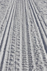 Snowmobile track mark on the snow