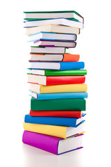 Pile of books on white background