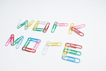Colorful Paper Clips Arranged as Working