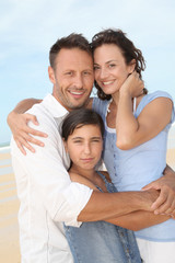 Portrait of happy family at the beach