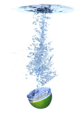 Fresh lime dropped into the water