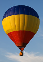Colorful hot air balloon on blue sky