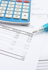 Bank statement,calculator and pen for Home Finance