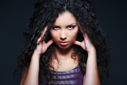 graceful woman with curly hair