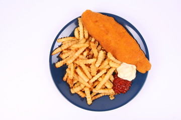 British cuisine: Fish and chips with ketchup and mayonnaise