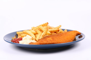 British cuisine: Fish and chips with ketchup and mayonnaise