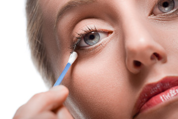 Removing make-up with cotton bud
