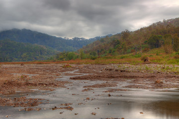 view of a drying river bed in hdr