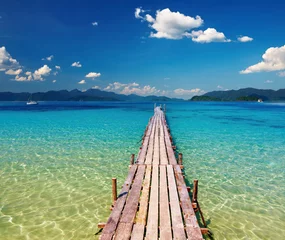 Poster Wooden pier in tropical paradise © Dmitry Pichugin