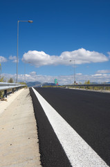 White Sideline On The Black Asphalt