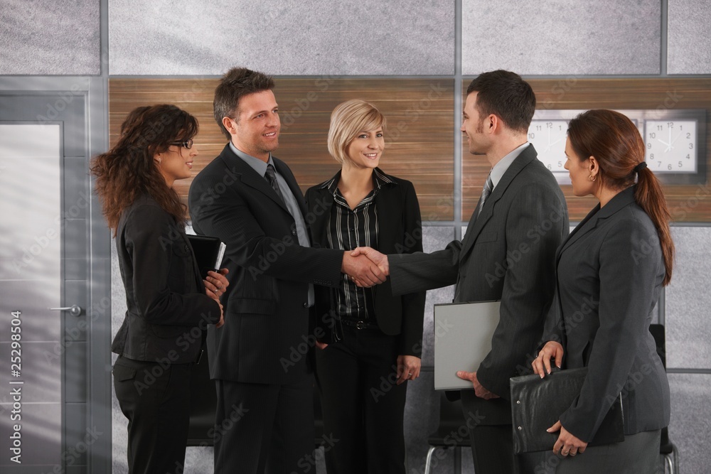 Canvas Prints Smiling businessmen shaking hands