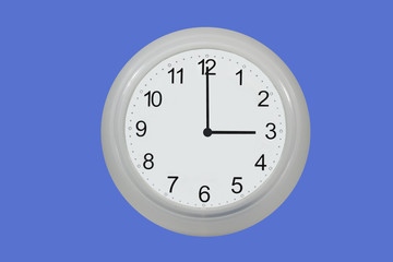 Wall clock isolated on blue