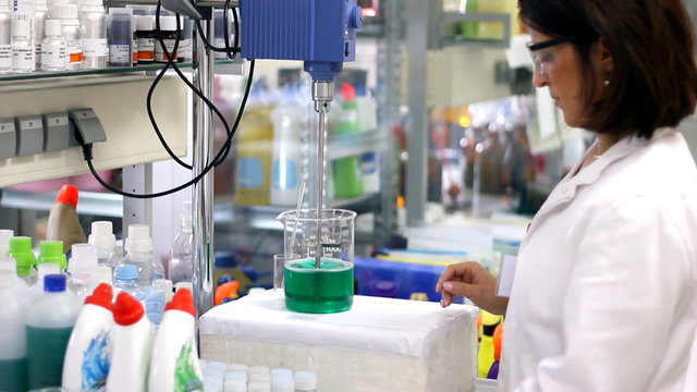 Researcher Working With Chemicals