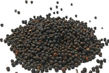 Heap of Black Pepper,Thai Indian Spice, isolated on White