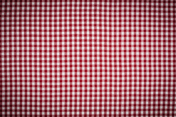 Red, White Gingham Checkered Tablecloth Background with Vignette