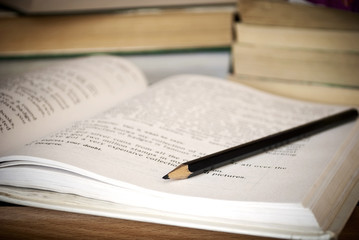 Black pencil on the book.