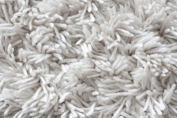 Detail of a white wool carpet