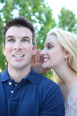 Fototapeta premium Man and woman Telling Secrets