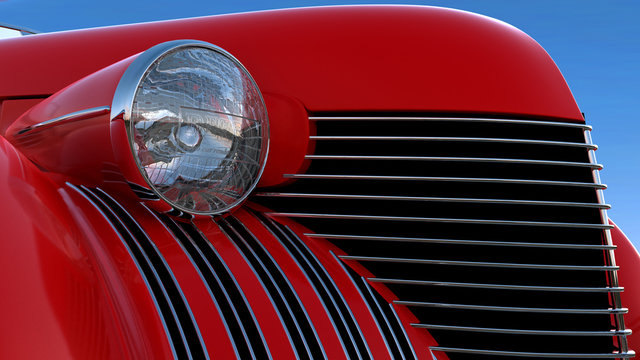 Headlight and engine jacket of red retro car