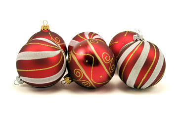 set of christmas baubles over a white background