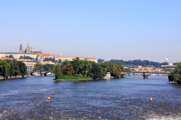 Fototapeta premium The View on summer Prague above River Vltava with gothic Castle