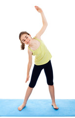 Active girl exercising isolated on white background