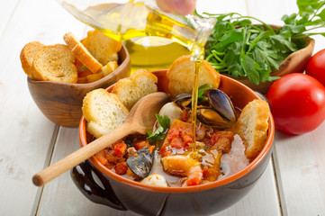 oil over fish soup-olio su zuppa di pesce