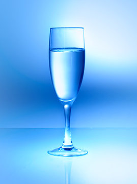 wineglass on blue background