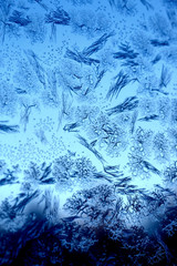 Frosty natural pattern on winter window