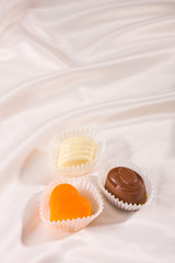 candies on silk background,shallow DOF