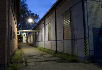 Industrial corridor at night