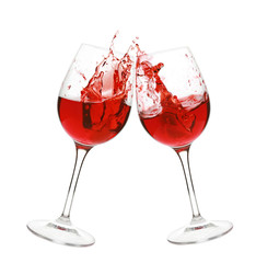 Red wine splash in two glasses