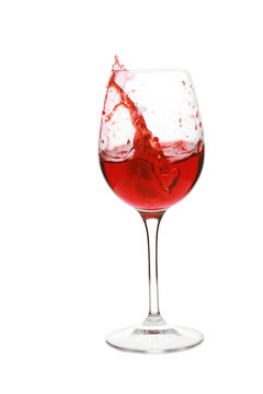 Pouring red wine in glass