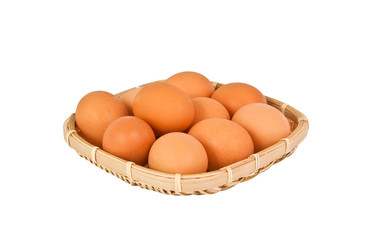 Fresh chicken eggs in basket