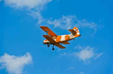 Classic aircraft fly blue sky