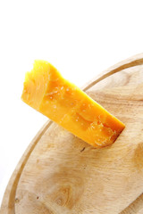 edam cheese on wood