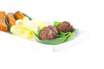 roast meatballs on basil