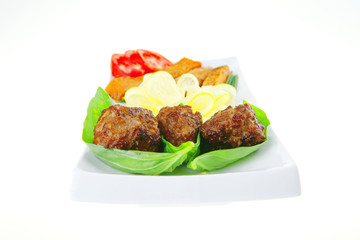 meatballs with tomatoes and lemon