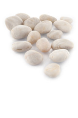 White stones on white background