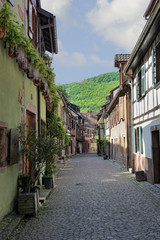 Charming lane with half-timbered houses in Kaysersberg